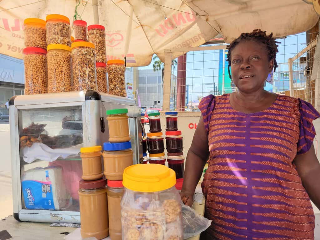 Accra - a vendor selling her natural peanut butter