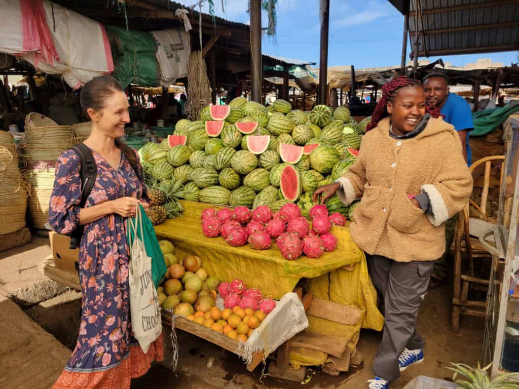 Immersing in local communities and shopping at local markets is fun and a great way to save